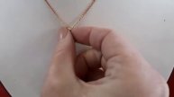 Кулон в виде ромба из золота с цирконами