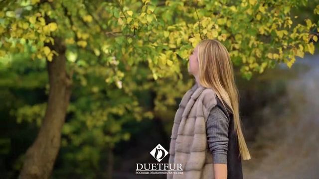 Длинный жилет