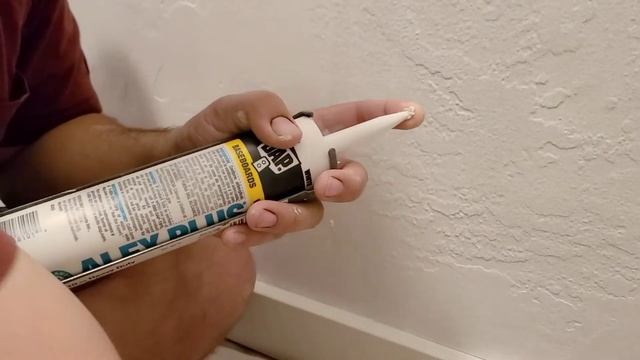 How To Caulk Baseboards and Trim (+ How To Load A Caulking Gun)