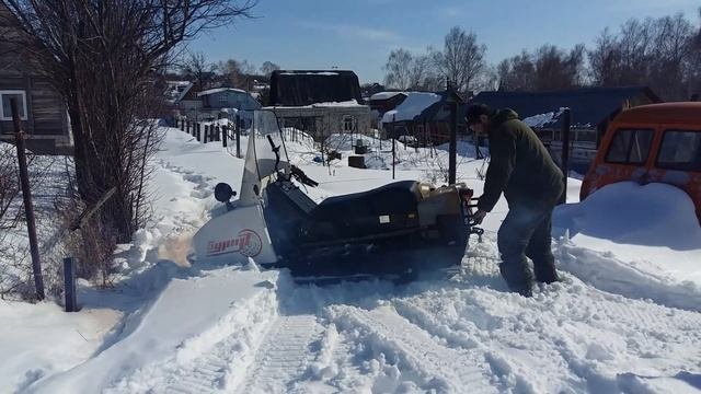 Делали тропинку на снегоходе Буран.В оттепель 10  по глубокому снегу.В гору.