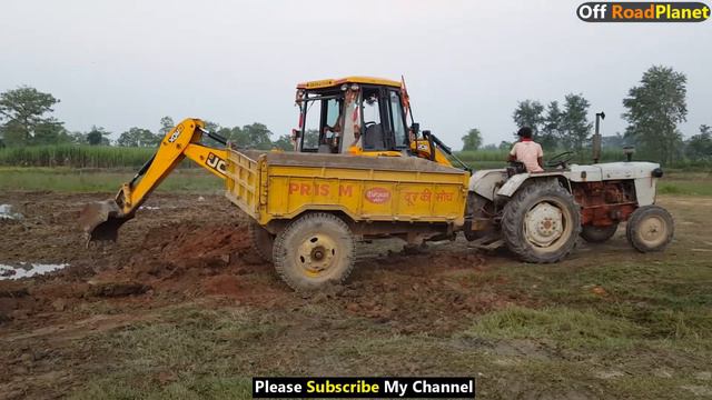 JCB Backhoe Machine Loading Mud on POWERTRAC 439 Tractor-JCB Working For Road Constructions -JCB