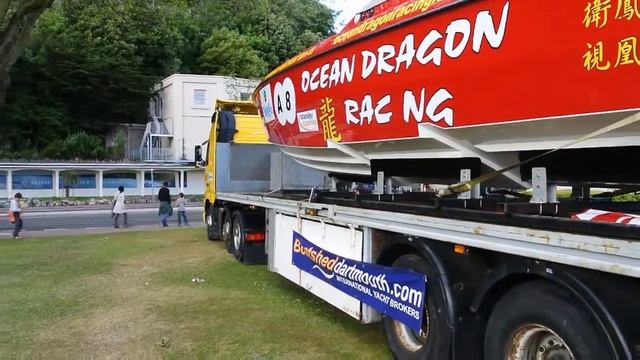 Volvo FH12 Low Loader Lorry with OffShore Racing boat on Torquay promenade