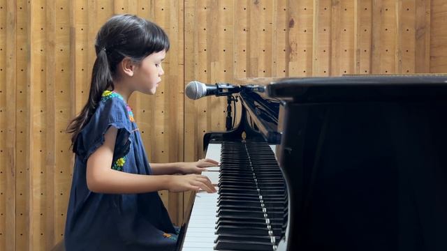 "Moon River" sung by Emilie