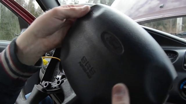 How to remove a ford escort mk6 wheel