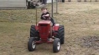 wheel horse kohler 12 hp pulling tractor