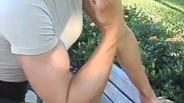 Fitness girl Popping her biceps peak