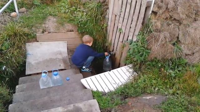 Колодец с бутылками