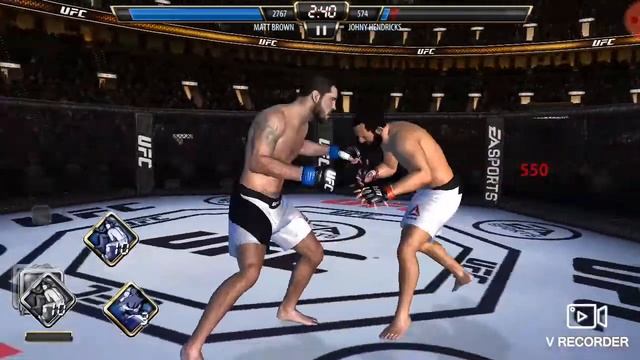 Продолжаю играть в UFC MOBILE выйргал бойца!!!