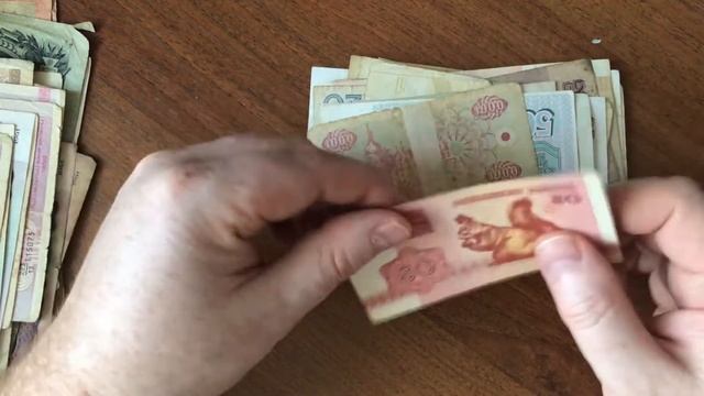 Распаковка посылки с кучей банкнот
