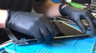 How to remove the black bar on MacBook screens