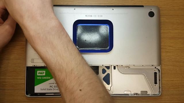 Apple MacBook Pro A1286 open to prepare for wifi problem repair