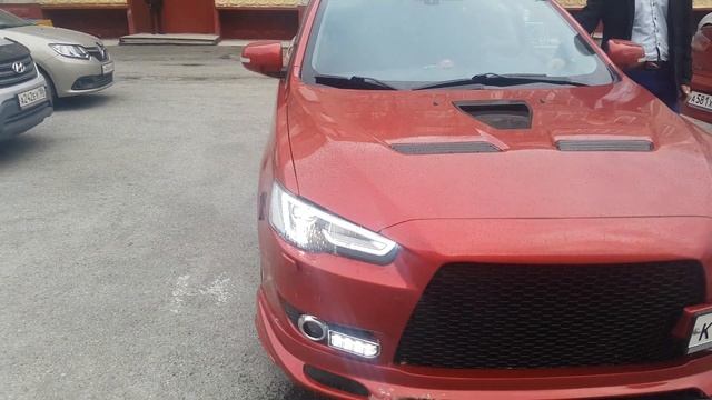 Полностью штатный омыватель фар Mitsubishi Lancer X