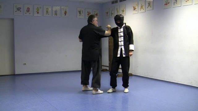 Ушу вариант защиты от удара