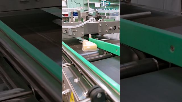 Автоматическая линия взвешивания и нанесения этикетки на сыр - ИноксДрайв