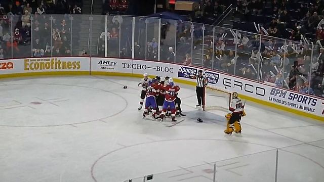 Laval Rocket's Riley McKay and Belleville Senators' Jacob Bernard-Docker get into a fight 3/8/23