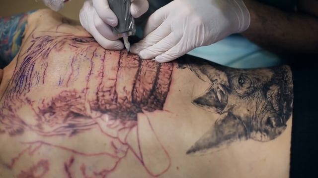 The Rhinoceros Tattoo · Татуировка носорога
