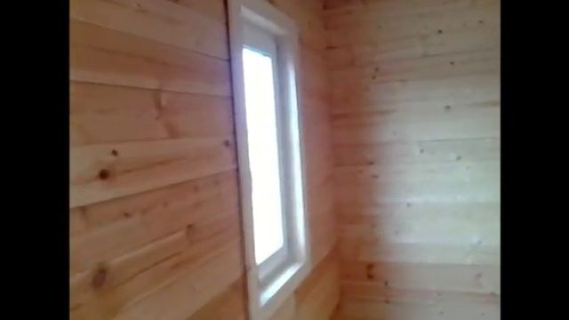 Красивый брусовой дом с эркером 9х11