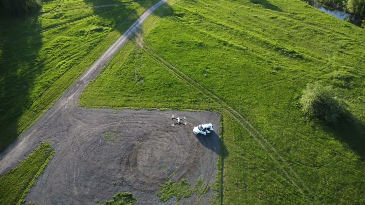 DJI Mini 2 наблюдает за SJRC  F11S