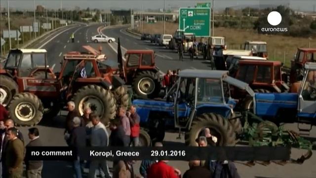 Greek farmers block Athens airport highway junction with tractors