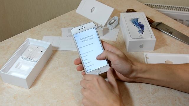 Распаковка iPhone 6S из США и первое включение