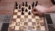 Шахматы. Конь,слон и ферзь побеждают сицилианку. Окружаем рокировку.