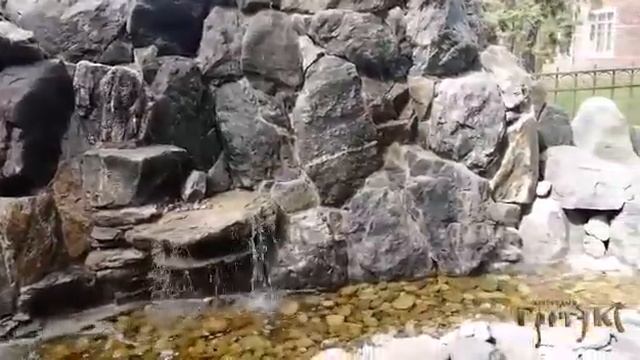 Обзор водопада из природного камня.