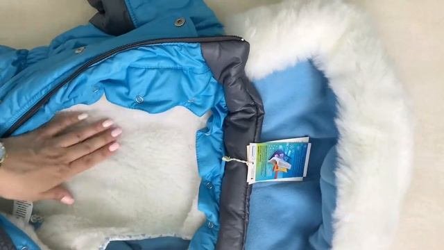 КОМБИНЕЗОН НА ПРИСТЕГИВАЮЩЕЙСЯ ПОДКЛАДКЕ ИЗ ОВЧИНЫ.