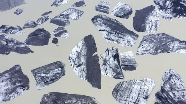 Aerial view of floating icebergs in Svinafellsjokull lake. Vatnajokull National Park, Iceland