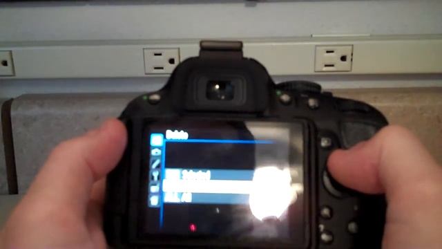 How to delete a photo on the Nikon DSLR D5100 camera