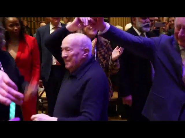 His Majesty King Charles III of England dancing with Jewish on Chanukah