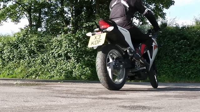 Honda CBR 250 with and without exhaust