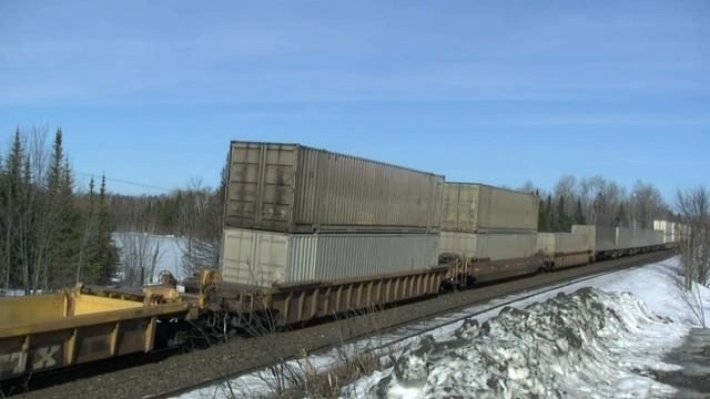CP stacks and autoracks  on CN tracks heading south from Sudbury at Ardbeg on March 18 2009