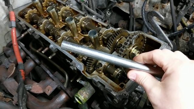 How to remove a Toyota camshaft bolt  (head gasket job) 3RZ-FE