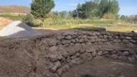 Rock Retaining Wall Construction with Yanmar VIO 55 and ASV Compact Track Loader.