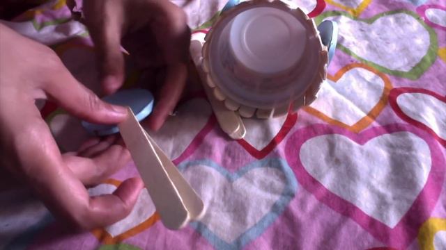 DIY bicycle using popsicle stick and ice cream cup .Crafts for kids.