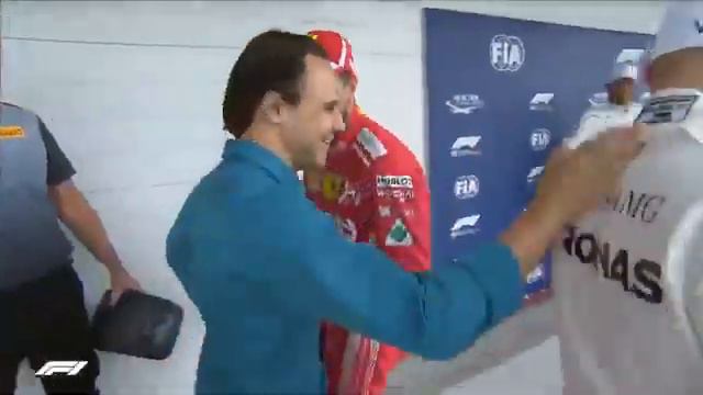 Vettel pretends to get an electric shock from shaking Massa's hand (Brazil, 2018)