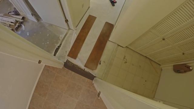 Higgs Flooring - Remodel - Tile Removal Laminate Install