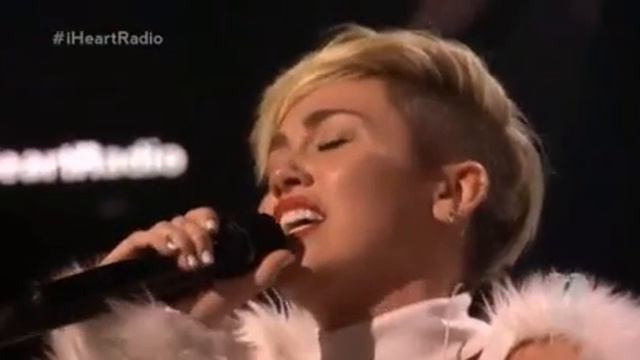 Miley Cyrus cries during Wrecking Ball at iHeartRadio Festival