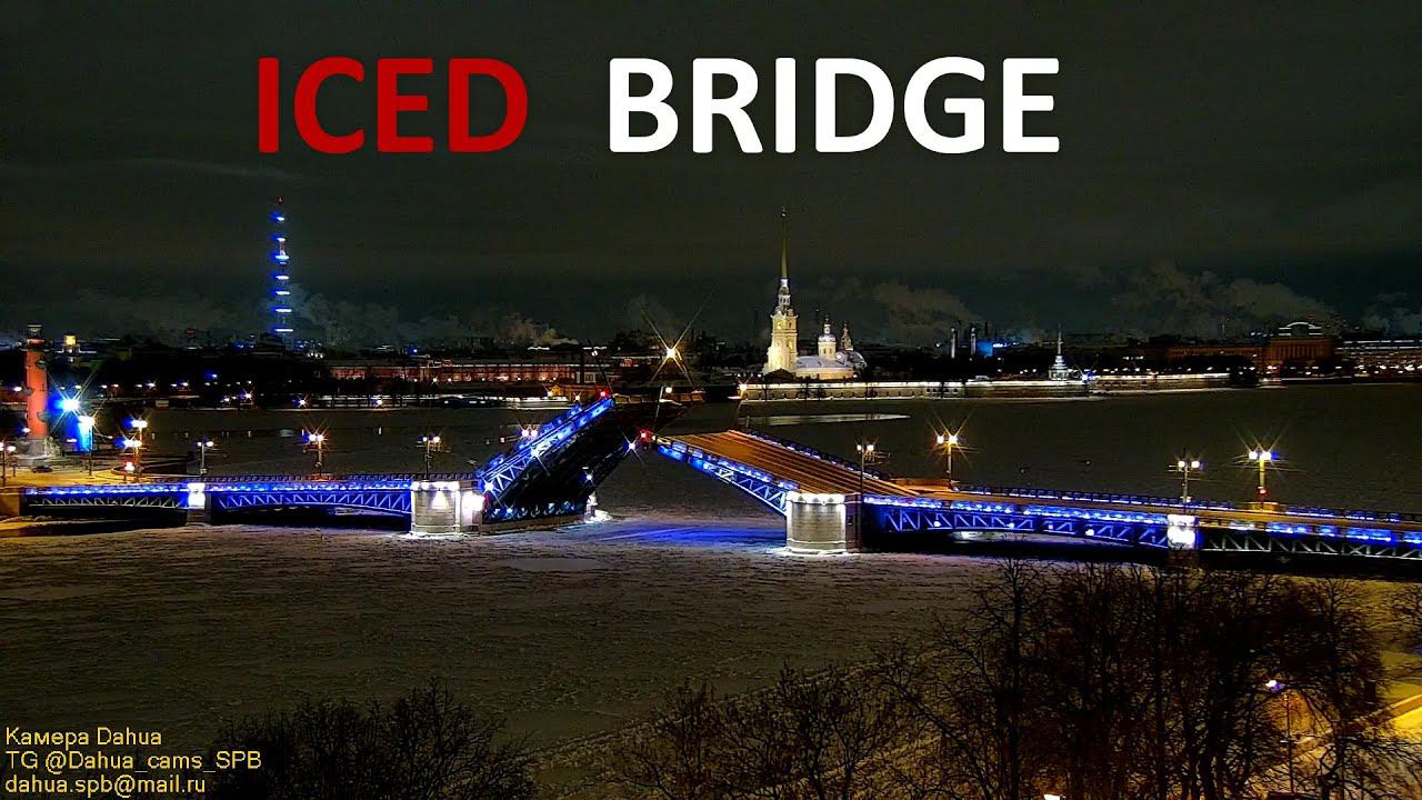 Iced bridge opened in St. Petersburg on a frosty winter night in the New Year's decoration