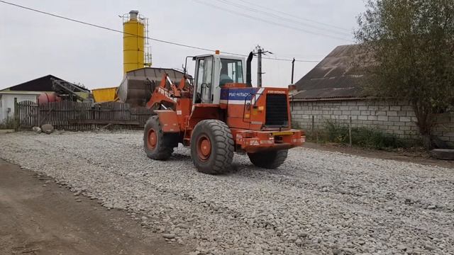 Paul H.(work )Fiat Hitachi 130.2..la munca ..indrepram curtea.