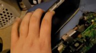 HP Mini 110-1125NR in complete disarray.