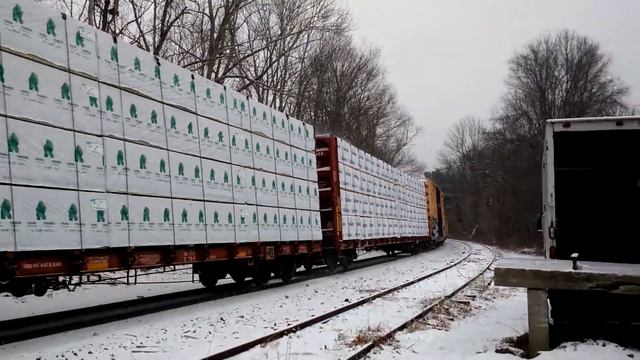 New England Central 608 echoes through the snow in Mansfield Depot Connecticut