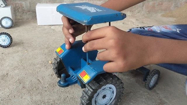 Mini Blue tractor trolley tyres re - fitting tractor video