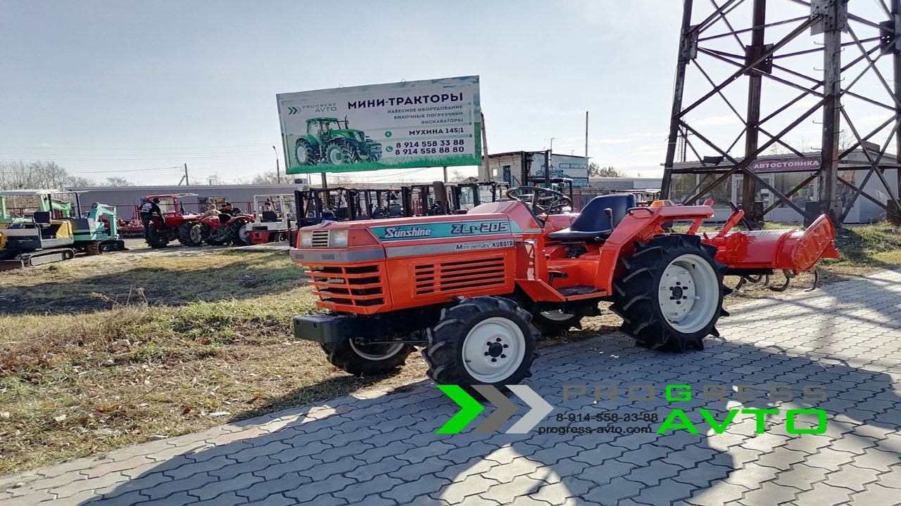 Пахать косить окучивать капать сажать трактором Kubota ZL1 205 с фрезой плугом и другим навесным