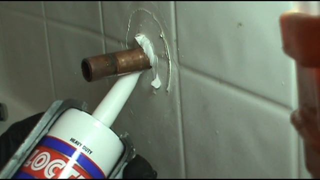 How to Fix a Loose Tub Spout