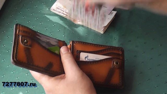 Большой зажим для денег.