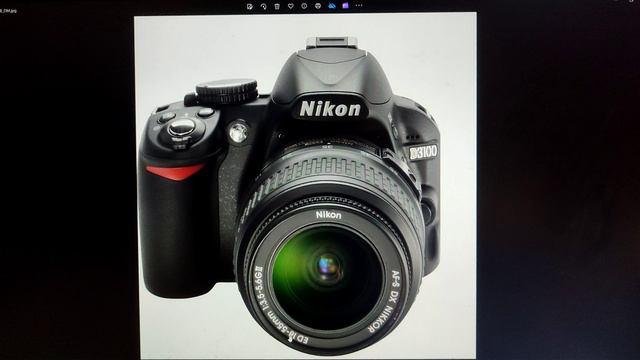 Обзор фронтальной части зеркальной фотокамеры Nikon D3100
