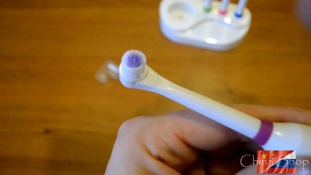 Электрическая зубная щетка из Китая