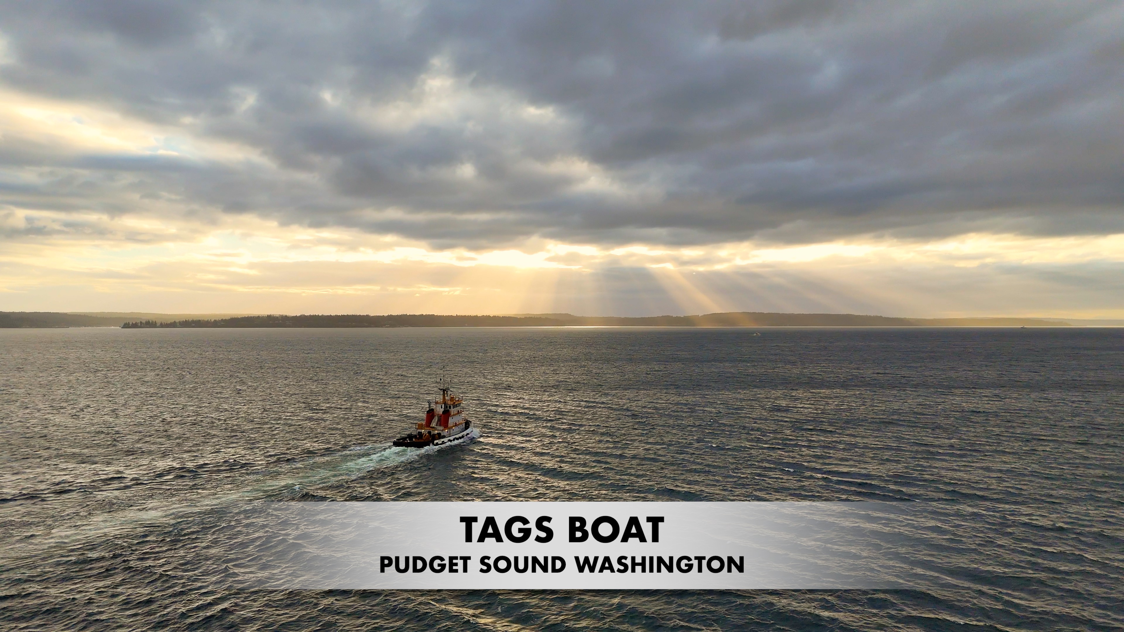Voyage Through Puget Sound: Boat and Barge Heading to Alaska