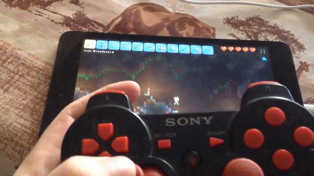 Terraria on iOS using PS3 controller.
